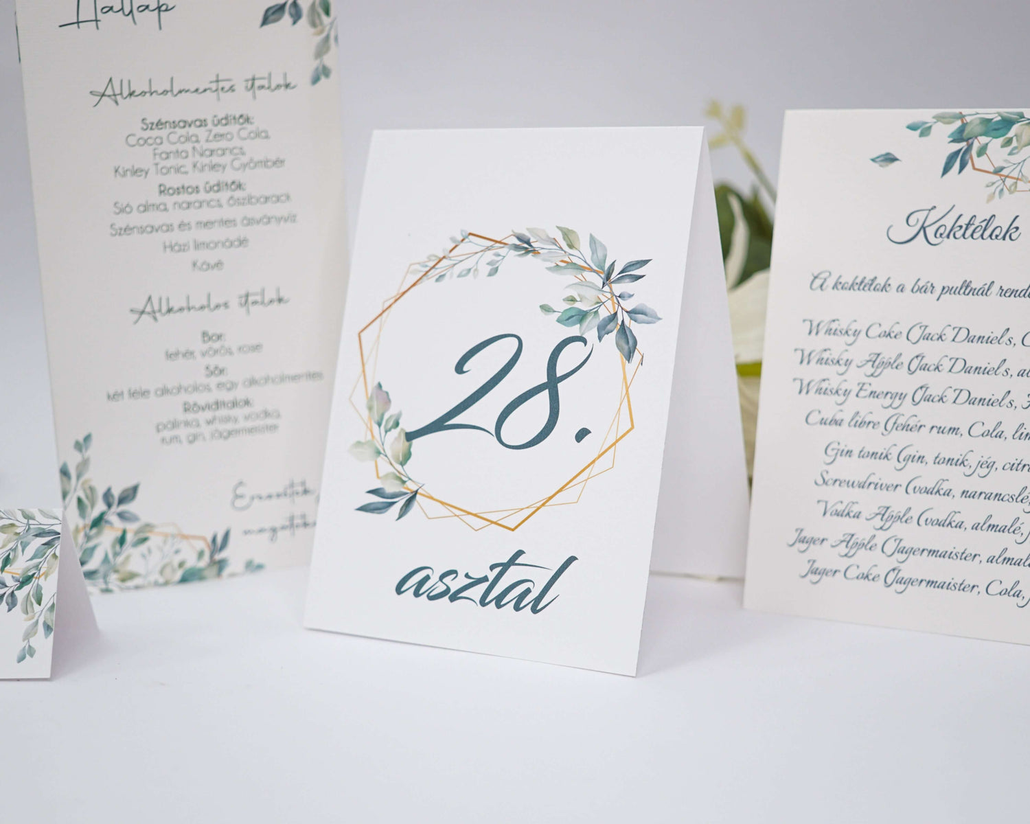 Table number 28 with floral design, ideal for wedding or event seating arrangement.